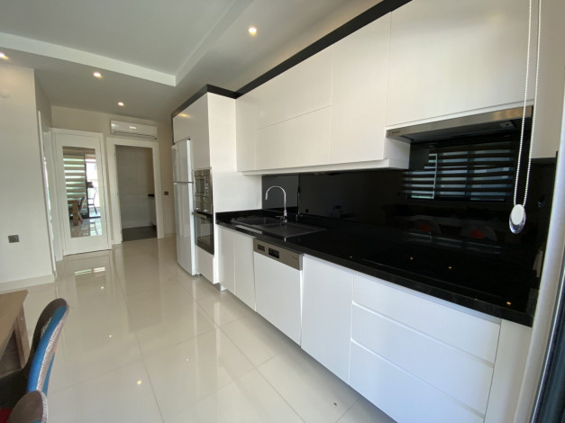 Две квартиры 2+1 в комплексе на первой линии моря, 100 м2 - Ракурс 9