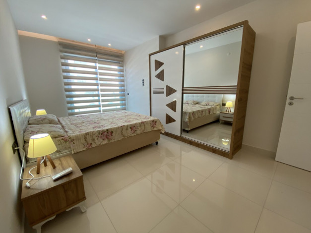 Две квартиры 2+1 в комплексе на первой линии моря, 100 м2 - Ракурс 11