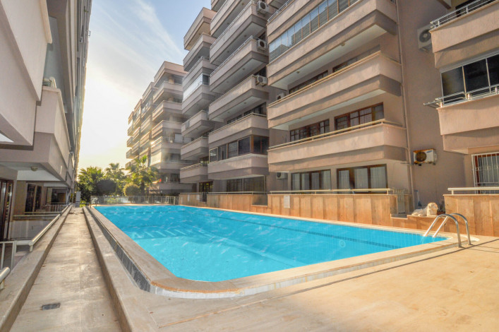 Двухкомнатная квартира на первой линии с современной мебелью в Махмутлар, 65 м2 - Ракурс 5