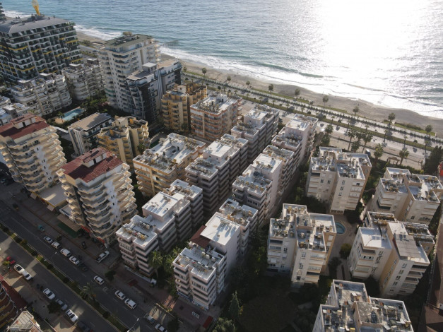 Двухкомнатная квартира на первой линии с современной мебелью в Махмутлар, 65 м2 - Ракурс 11