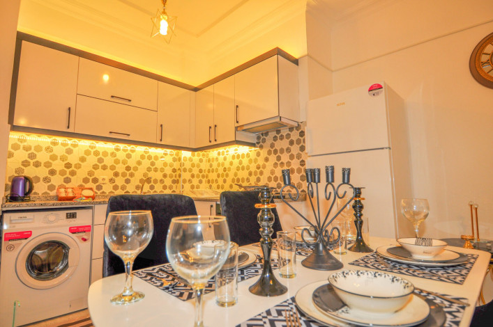 Двухкомнатная квартира на первой линии с современной мебелью в Махмутлар, 65 м2 - Ракурс 12