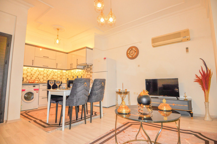 Двухкомнатная квартира на первой линии с современной мебелью в Махмутлар, 65 м2 - Ракурс 14