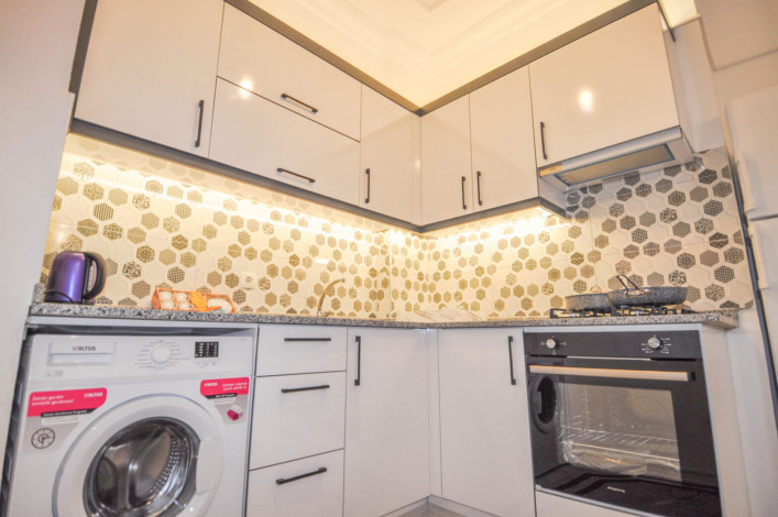 Двухкомнатная квартира на первой линии с современной мебелью в Махмутлар, 65 м2 - Ракурс 22