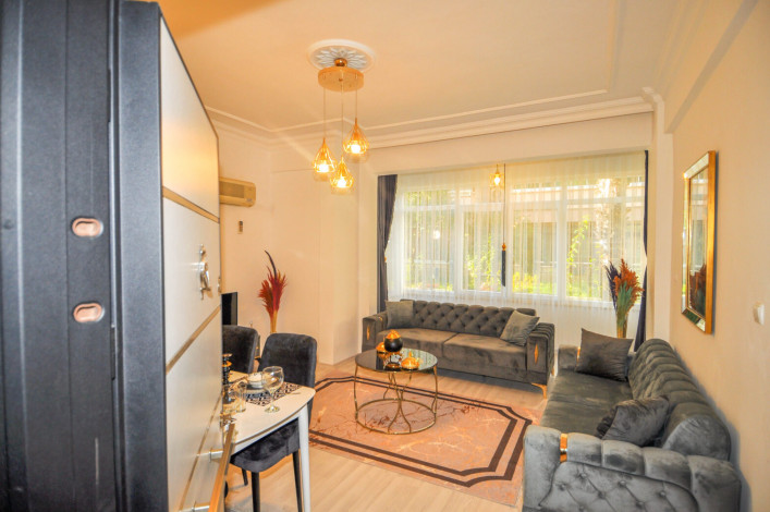 Двухкомнатная квартира на первой линии с современной мебелью в Махмутлар, 65 м2 - Ракурс 23