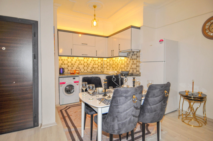 Двухкомнатная квартира на первой линии с современной мебелью в Махмутлар, 65 м2 - Ракурс 25