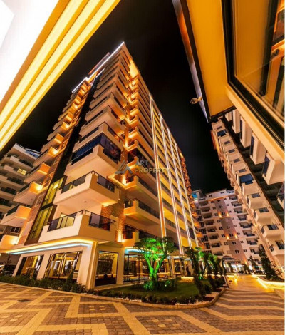 Трехкомнатная квартира в одном из больших комплексов района Махмтулар, 120 м2 - Ракурс 2