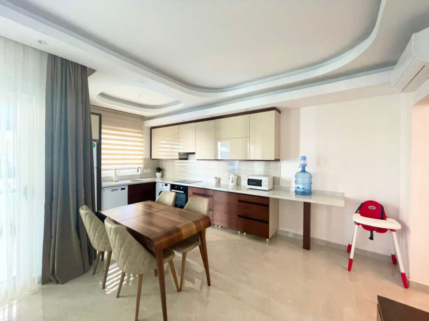 Трехкомнатная квартира в одном из больших комплексов района Махмтулар, 120 м2 - Ракурс 9