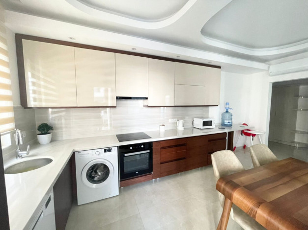 Трехкомнатная квартира в одном из больших комплексов района Махмтулар, 120 м2 - Ракурс 11