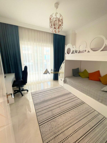 Трехкомнатная квартира в одном из больших комплексов района Махмтулар, 120 м2 - Ракурс 15