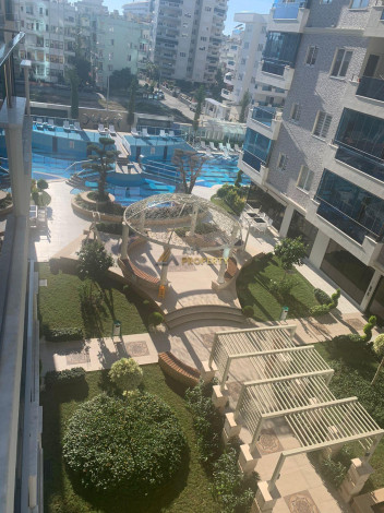 Трехкомнатная квартира в одном из больших комплексов района Махмтулар, 120 м2 - Ракурс 23