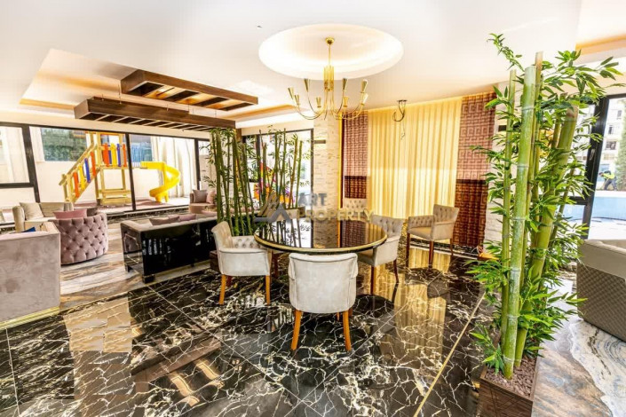 Трехкомнатная квартира в одном из больших комплексов района Махмтулар, 120 м2 - Ракурс 32