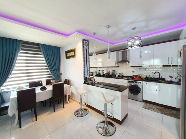 Мебелированный дуплекс 3+1 с видом на море и горы в районе Махмутлар, 170м - Ракурс 9