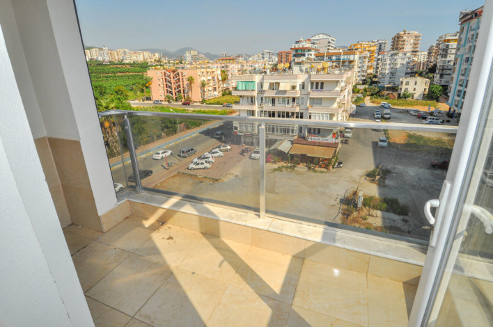 Просторная трехкомнатная квартира в 350 метрах от моря в Махмутлар, 115 м2 - Ракурс 2