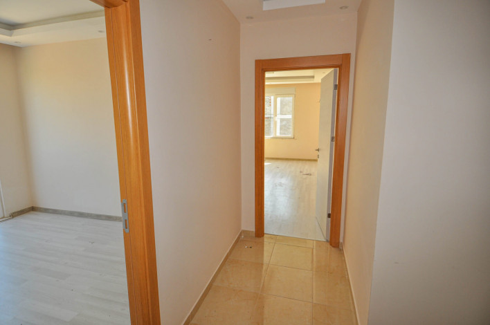 Просторная трехкомнатная квартира в 350 метрах от моря в Махмутлар, 115 м2 - Ракурс 4