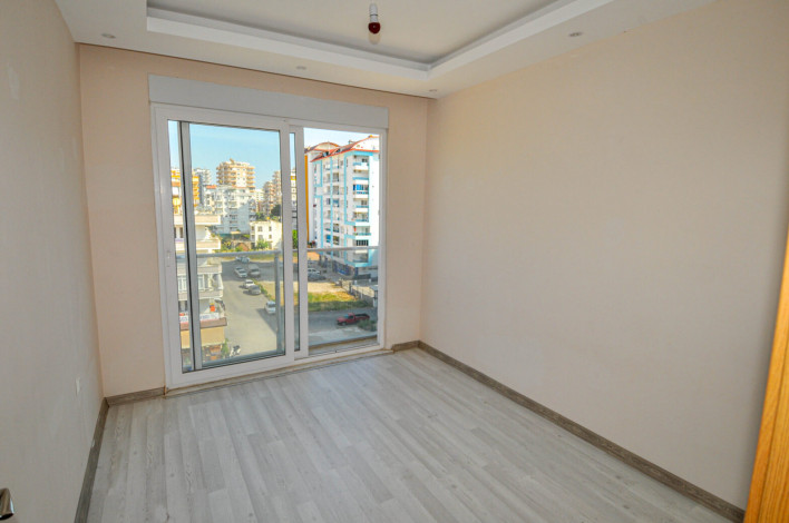 Просторная трехкомнатная квартира в 350 метрах от моря в Махмутлар, 115 м2 - Ракурс 9