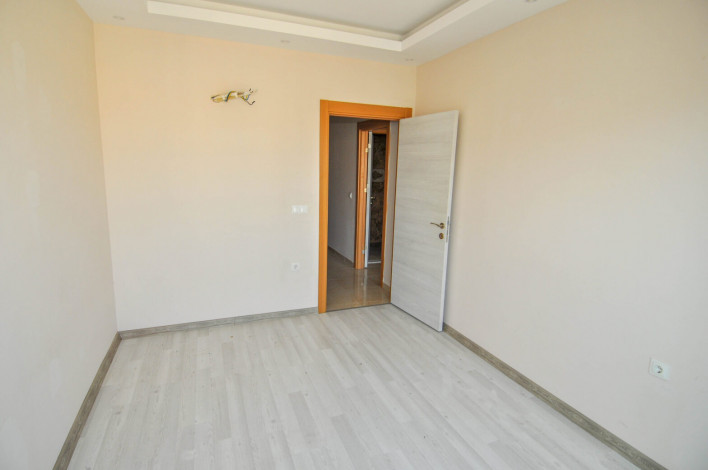 Просторная трехкомнатная квартира в 350 метрах от моря в Махмутлар, 115 м2 - Ракурс 10