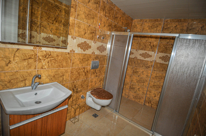 Просторная трехкомнатная квартира в 350 метрах от моря в Махмутлар, 115 м2 - Ракурс 16