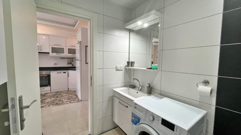 Квартира 1+1 в аренду в районе Махмутлар в комплексе с зимней инфраструктурой, 70 м2 - Ракурс 20