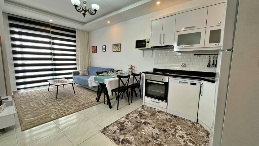 Квартира 1+1 в аренду в районе Махмутлар в комплексе с зимней инфраструктурой, 70 м2 - Ракурс 22