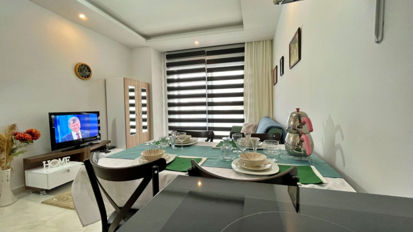 Квартира 1+1 в аренду в районе Махмутлар в комплексе с зимней инфраструктурой, 70 м2 - Ракурс 24