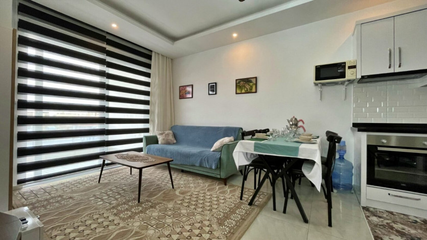 Квартира 1+1 в аренду в районе Махмутлар в комплексе с зимней инфраструктурой, 70 м2 - Ракурс 25