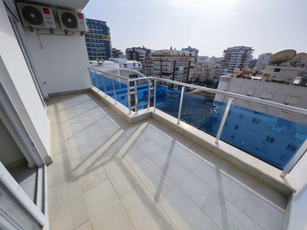 Квартира 1+1 в аренду в районе Махмутлар в комплексе с зимней инфраструктурой, 70 м2 - Ракурс 34