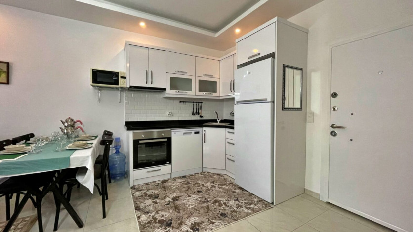 Квартира 1+1 в аренду в районе Махмутлар в комплексе с зимней инфраструктурой, 70 м2 - Ракурс 41