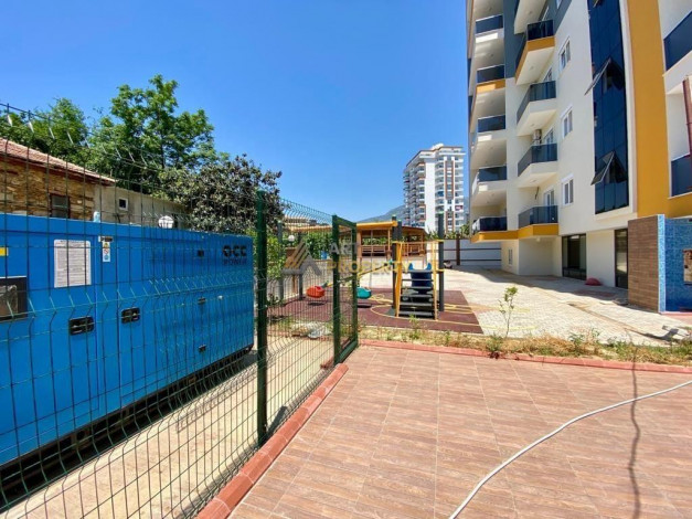 Полностью меблированная двухкомнатная квартира в районе Махмутлар, 50м2 - Ракурс 2