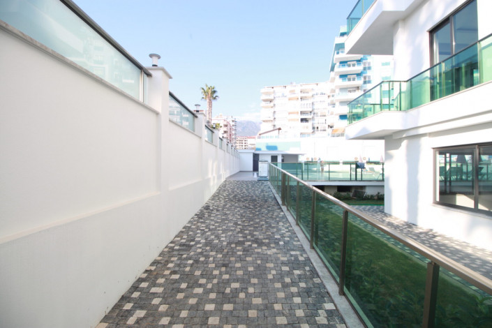 Квартиры 1+1 и 2+1 на первой линии моря в районе Махмутлар, 55 -100 м2 - Ракурс 8