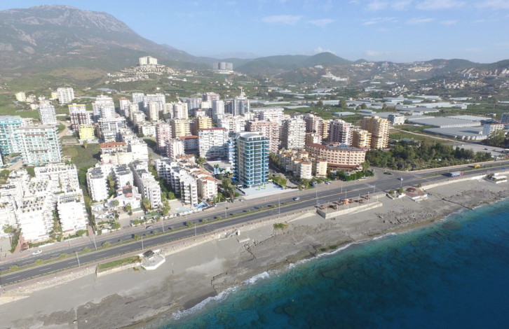 Квартиры 1+1 и 2+1 на первой линии моря в районе Махмутлар, 55 -100 м2 - Ракурс 15