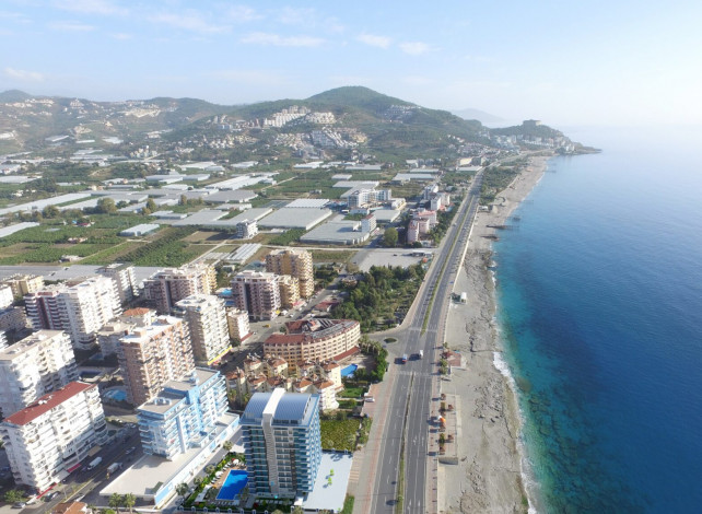 Квартиры 1+1 и 2+1 на первой линии моря в районе Махмутлар, 55 -100 м2 - Ракурс 16