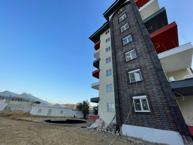 Квартира планировки 1+1 в новостройке в Авсалларе, 55 м2 - Ракурс 6