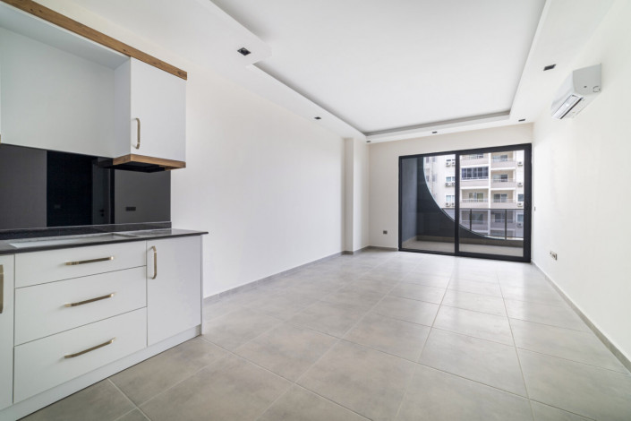 Просторная двухкомнатная квартира в комплексе с отельной инфраструктурой в районе Махмулар, 65 м2 - Ракурс 7