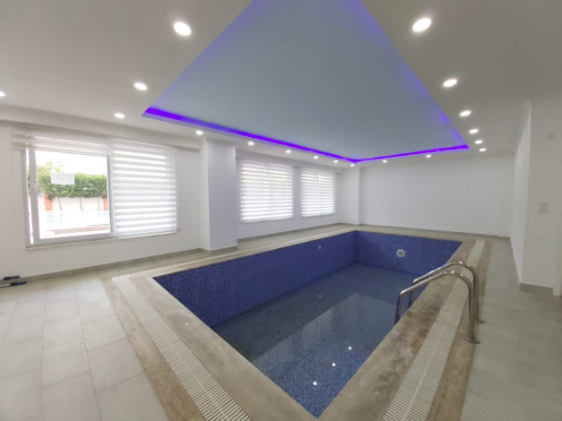 Квартира 1+1  в районе Махмутлар в комплексе с зимней инфраструктурой, 70 м2 - Ракурс 21