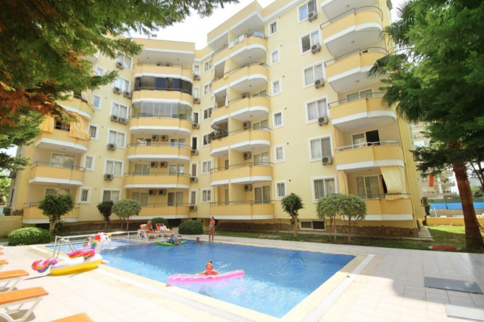 Полностью меблированная двухкомнатная квартира на 6 этаже в Махмутлар, 65 м2 - Ракурс 12