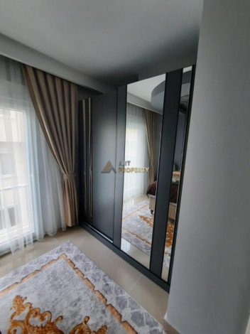 Апартаменты 2+1 с новой мебелью и бытовой техникой рядом с морем в Махмутлар, 70м2 - Ракурс 21