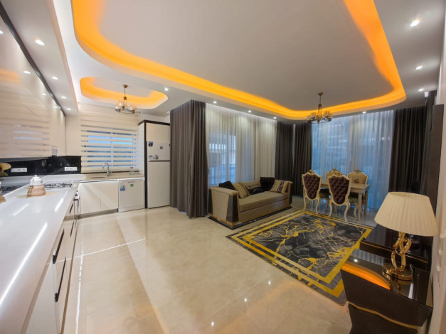 Полностью меблированная трехкомнатная квартира в комплексе премиум класса в районе Махмутлар, 110м - Ракурс 4