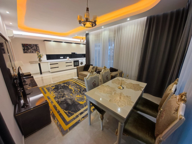 Полностью меблированная трехкомнатная квартира в комплексе премиум класса в районе Махмутлар, 110м - Ракурс 5