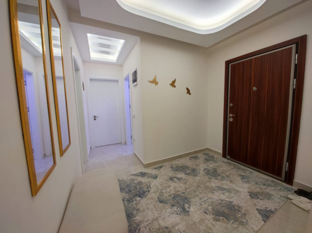 Полностью меблированная трехкомнатная квартира в комплексе премиум класса в районе Махмутлар, 110м - Ракурс 9