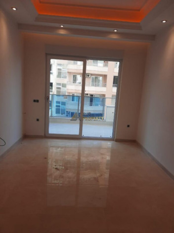 Двухкомнатные апартаменты в комплексе с богатой инфраструктурой в районе Махмутлар, 72м - Ракурс 8