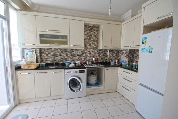 Трехкомнатная квартира на улице Барбаросса в районе Махмутлар, 90 м2 - Ракурс 6