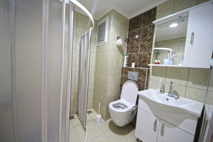 Трехкомнатная квартира на улице Барбаросса в районе Махмутлар, 90 м2 - Ракурс 12