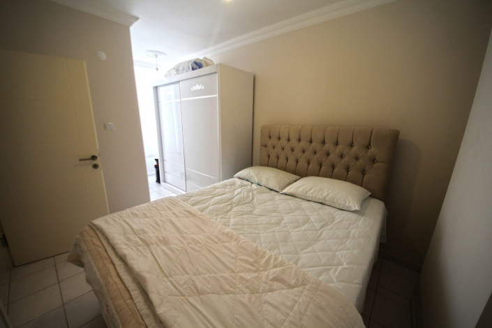 Трехкомнатная квартира на улице Барбаросса в районе Махмутлар, 90 м2 - Ракурс 14