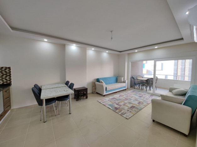 Меблированная двухкомнатная квартира с крытым бассейном в комплексе в районе Махмутлар, 60 м2 - Ракурс 3