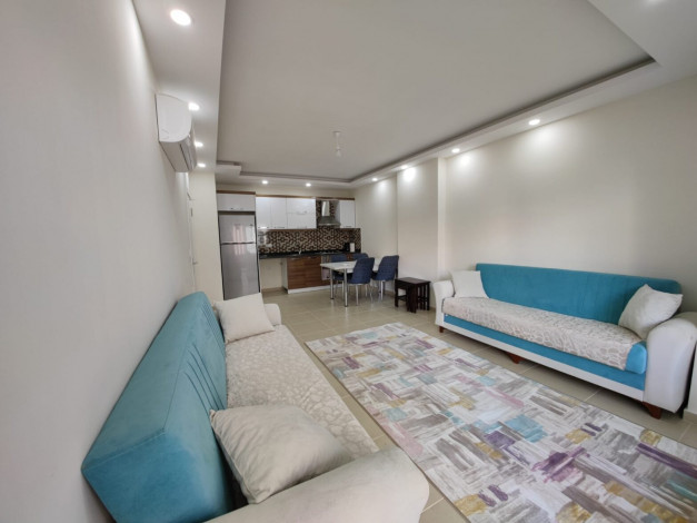 Меблированная двухкомнатная квартира с крытым бассейном в комплексе в районе Махмутлар, 60 м2 - Ракурс 6