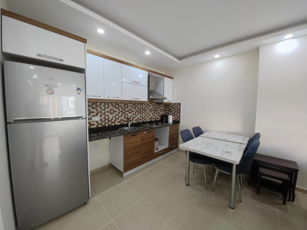 Меблированная двухкомнатная квартира с крытым бассейном в комплексе в районе Махмутлар, 60 м2 - Ракурс 8