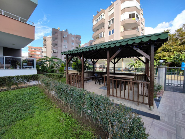 Меблированная двухкомнатная квартира с крытым бассейном в комплексе в районе Махмутлар, 60 м2 - Ракурс 11