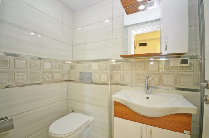 Трехкомнатная квартира с видом на море в комплексе с зеленым садом в Каргыджаке, 105 м2 - Ракурс 11