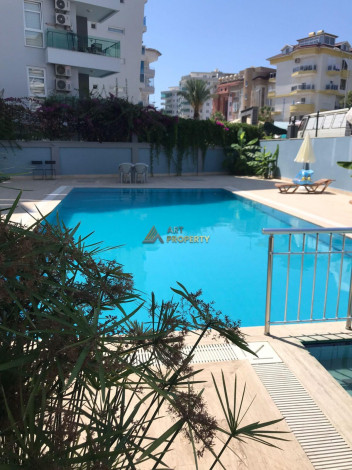 Просторная двухкомнатная квартира в 350 метрах от моря в Махмутлар, 70м2 - Ракурс 9