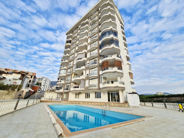 Меблированная квартира 2+1 с видом на город и частично на море в Махмутлар, 120 м2 - Ракурс 8